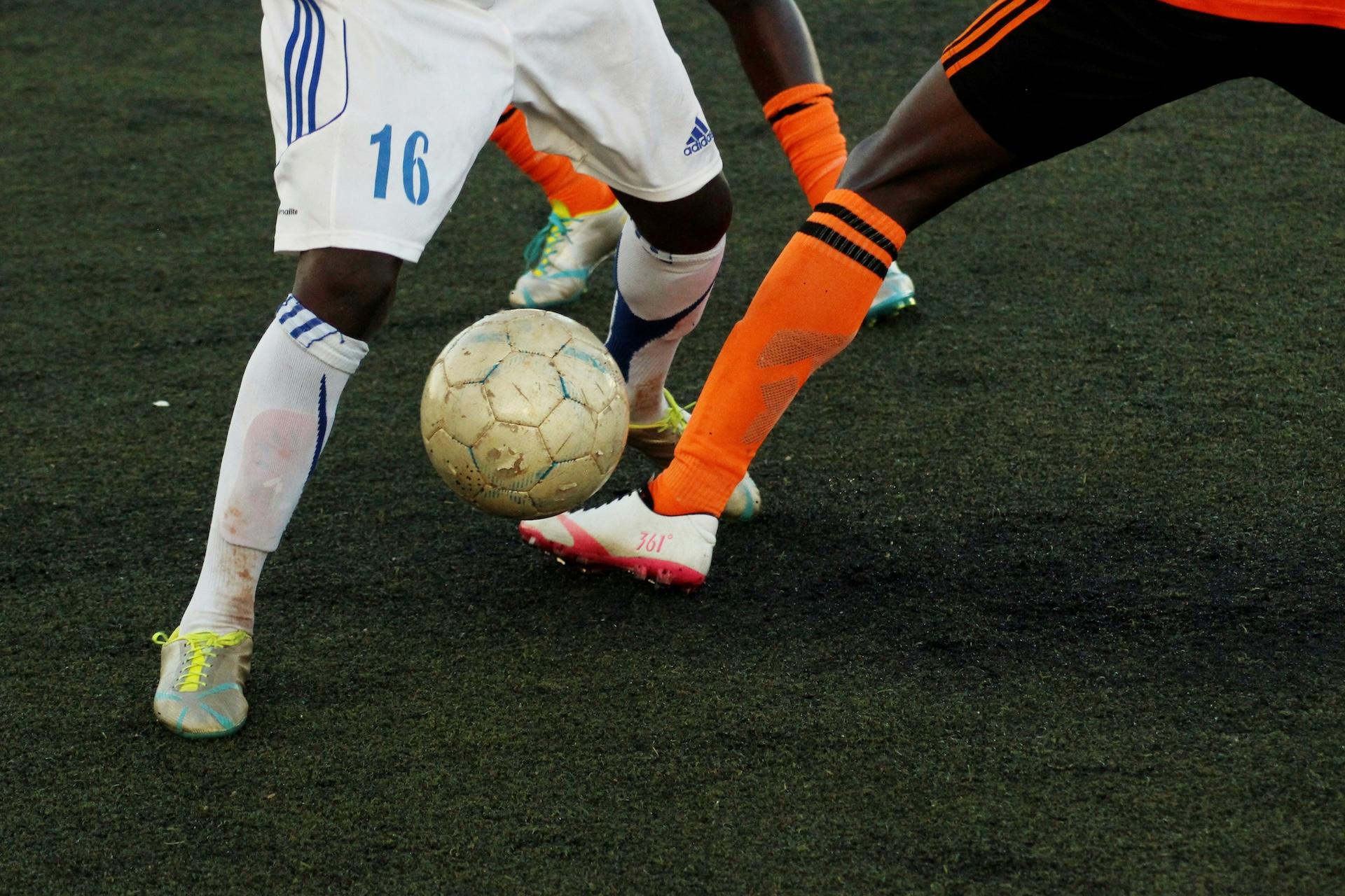 Football player tunneling his opponent